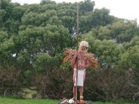 Native Kauaian with gourd helmet he made