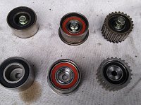 20200829 130527  Timing belt pulleys - old on the top row, new on the bottom row.